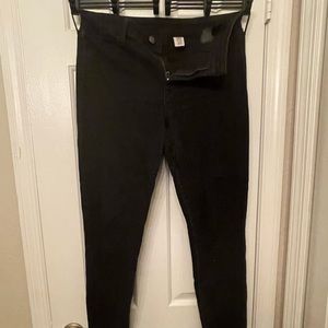 Black form fitting jeans